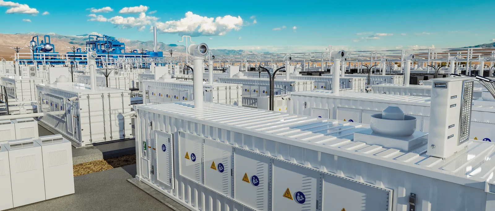 A row of containerized fuel cell power blocks seen along its length, with the reformer island in the distance.